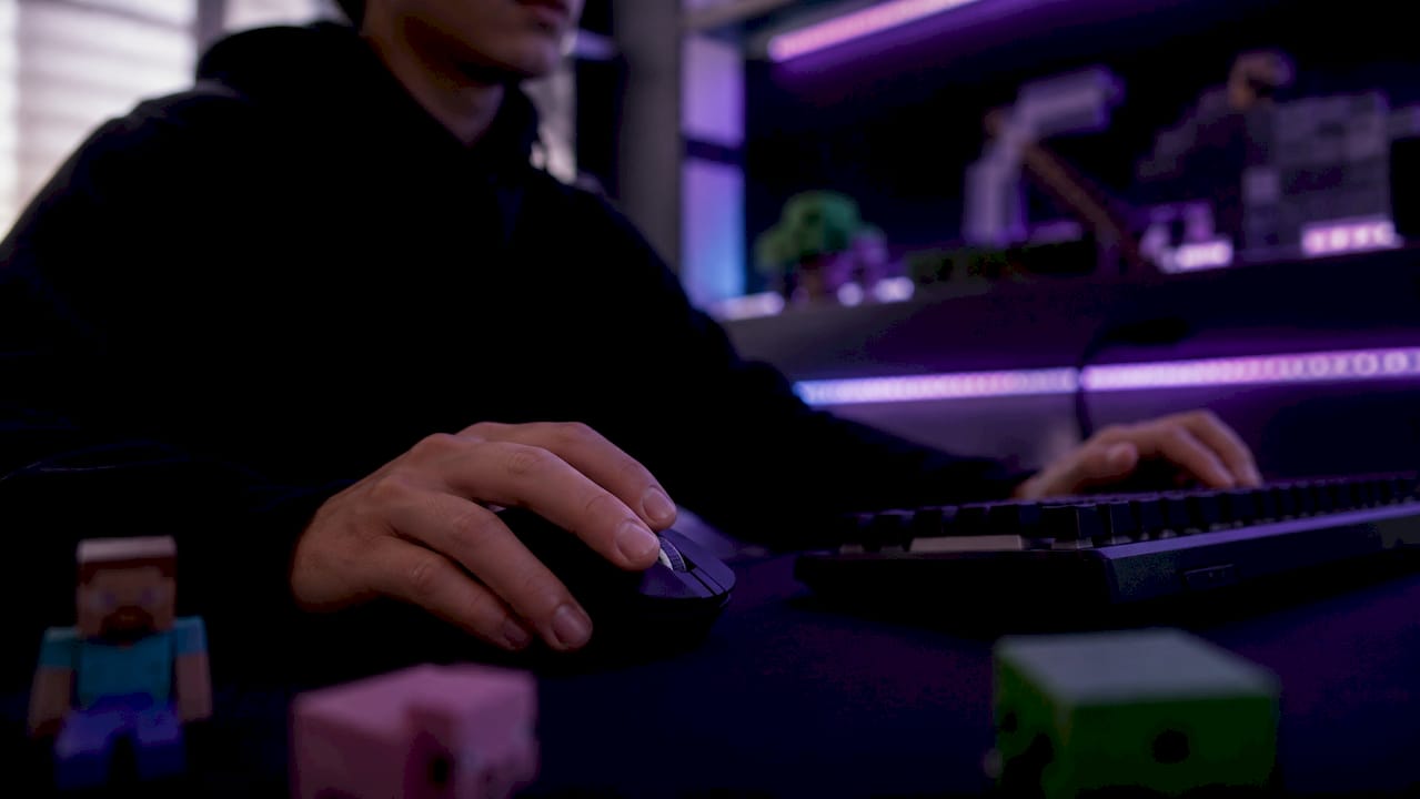 Hands controlling Minecraft browser game